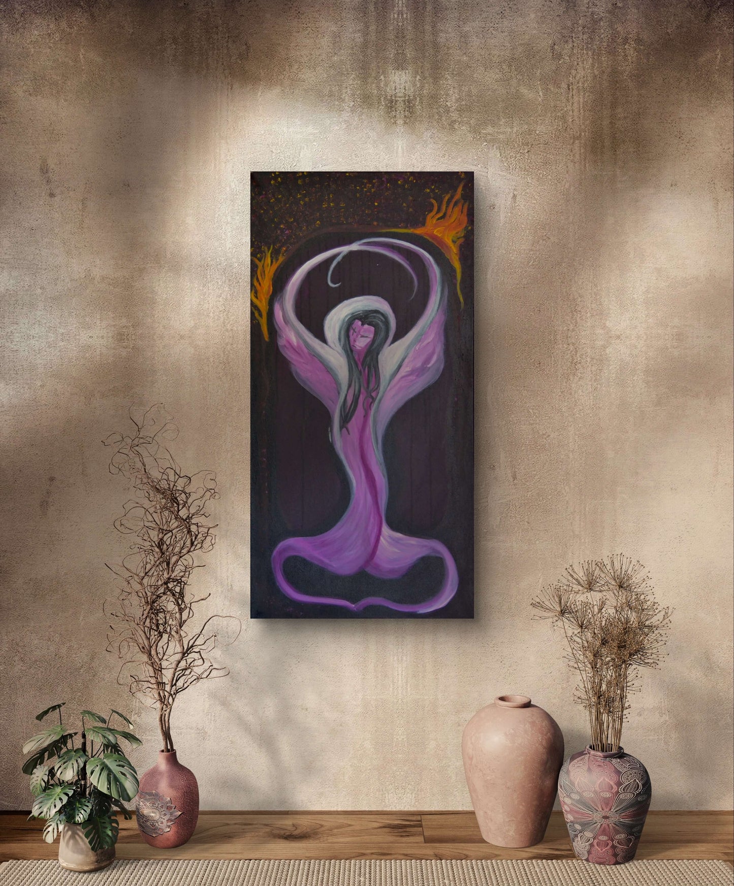 Purple woman painting on off-white wall behind vases and plants.