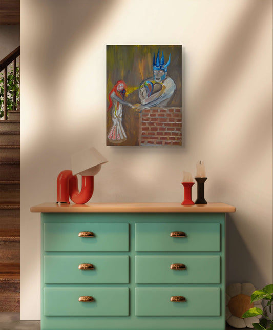 Two figure painting on white wall behind green dresser and candles.