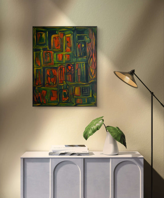 Abstract green and orange painting on off-white wall above white table and plant.