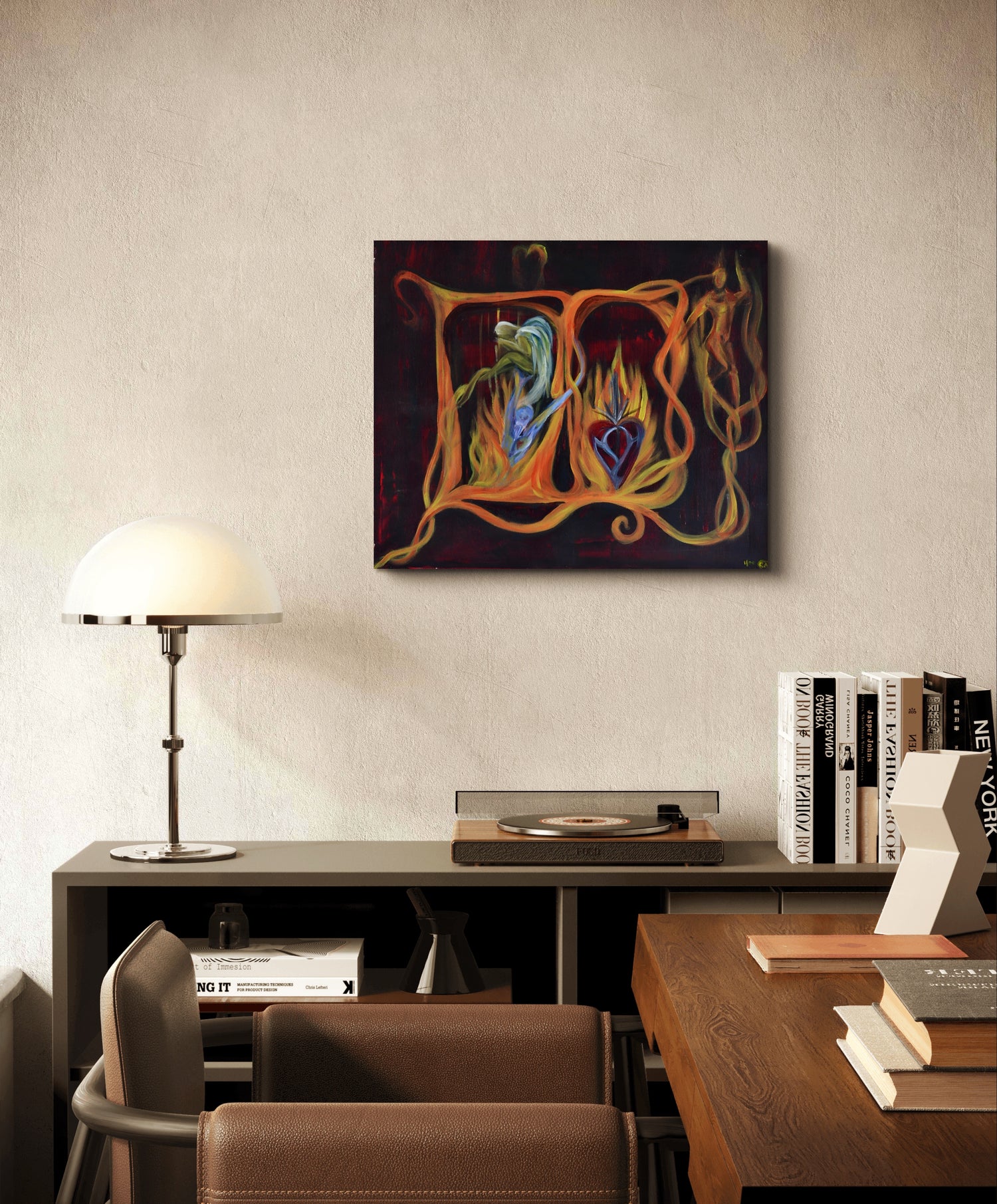 Orange soul painting on white wall above black table and vinyl player behind wooden desk.