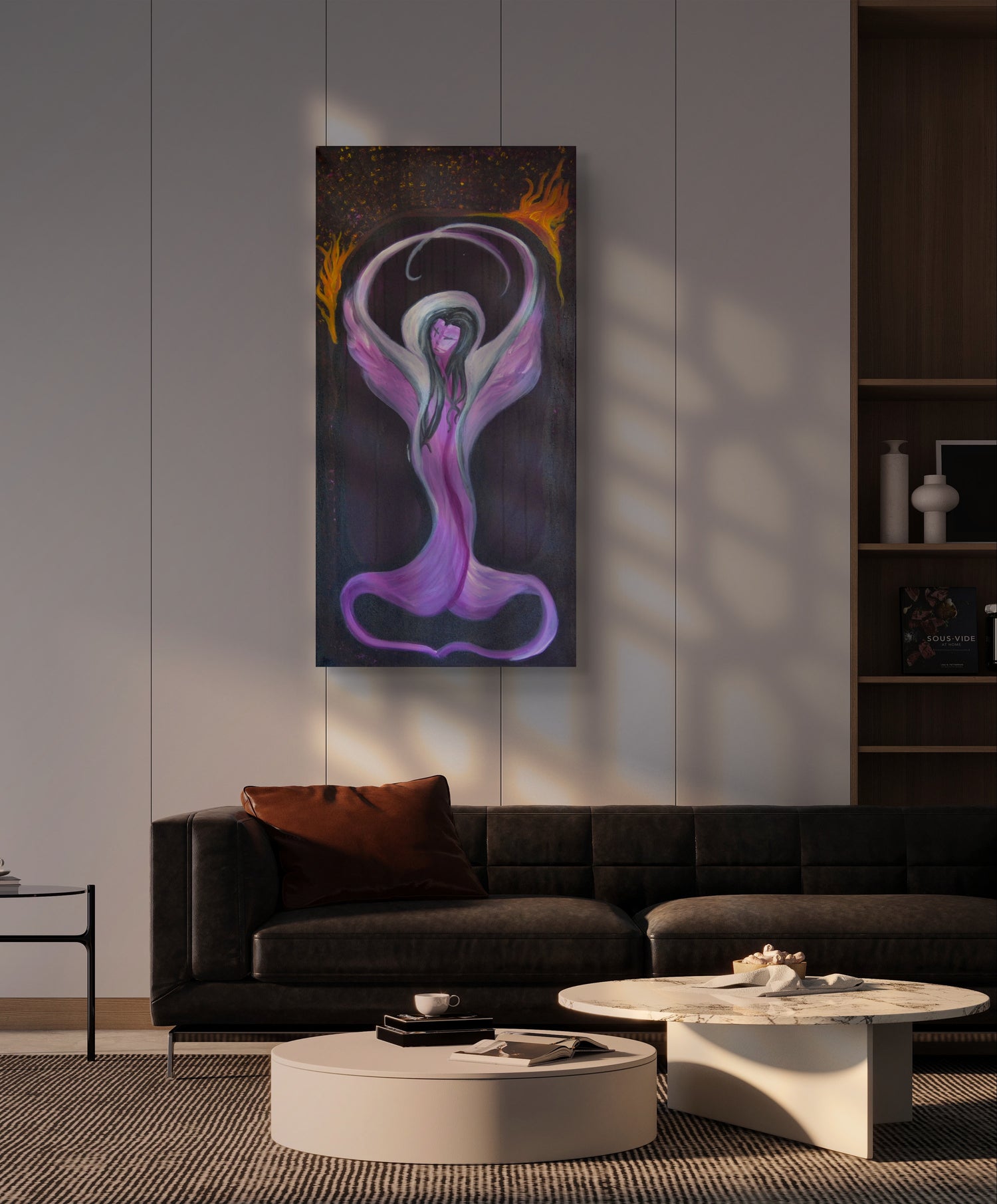 Purple painting on white wall above black couch, in a relaxing setting.