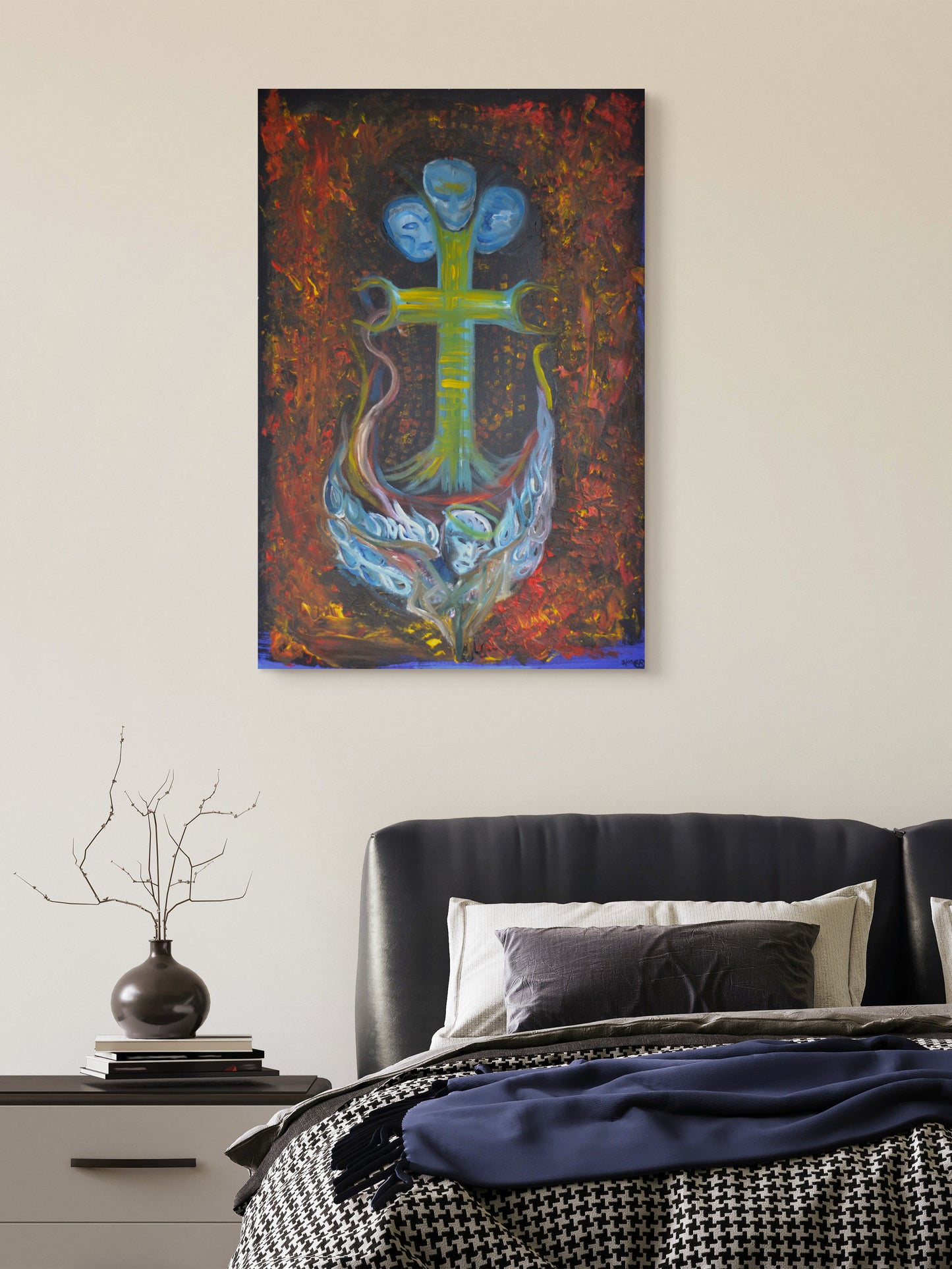 Ocean themed anchor painting on white wall above blue and black bed and nightstand.