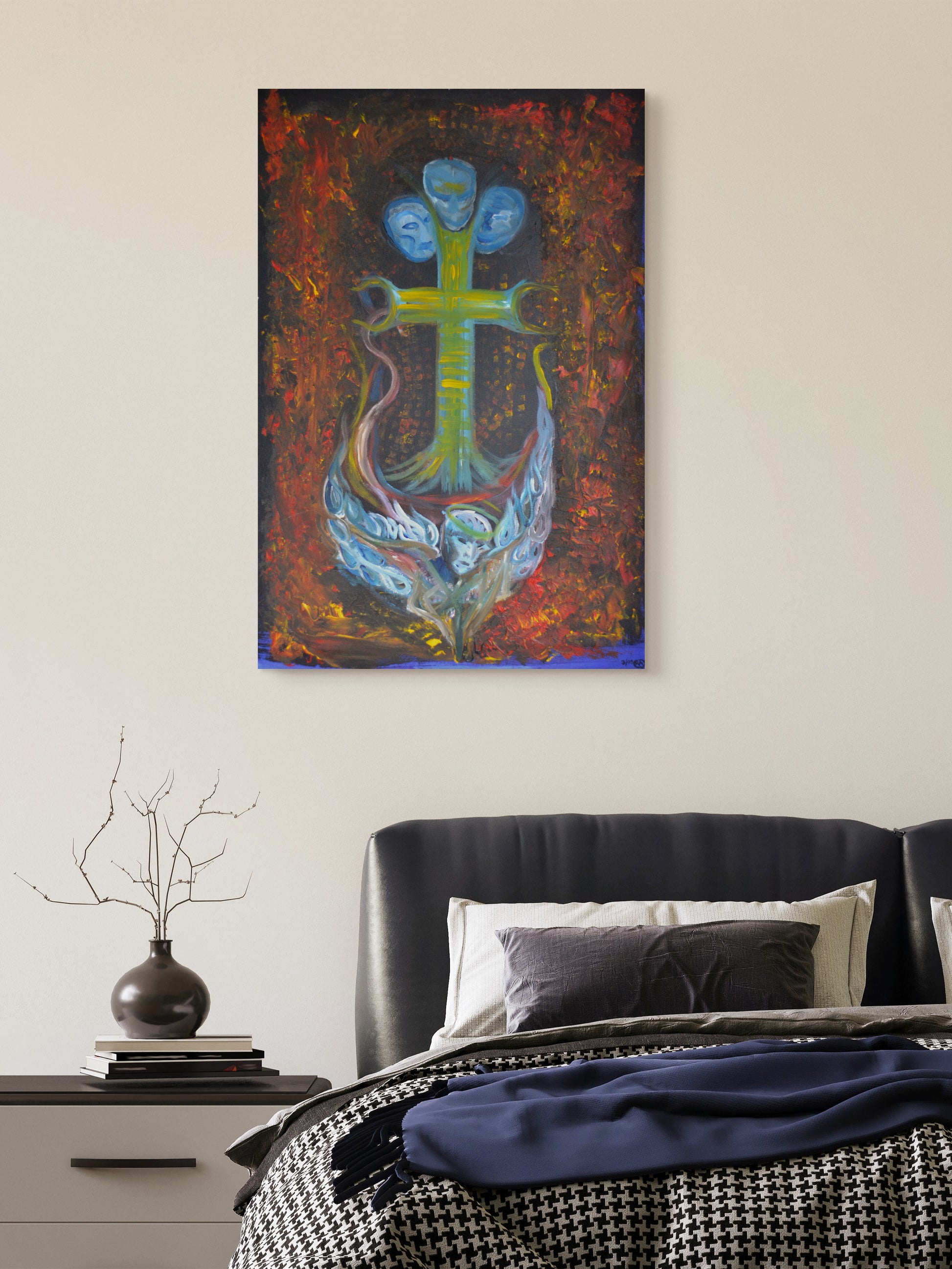 Ocean themed anchor painting on white wall above blue and black bed and nightstand.