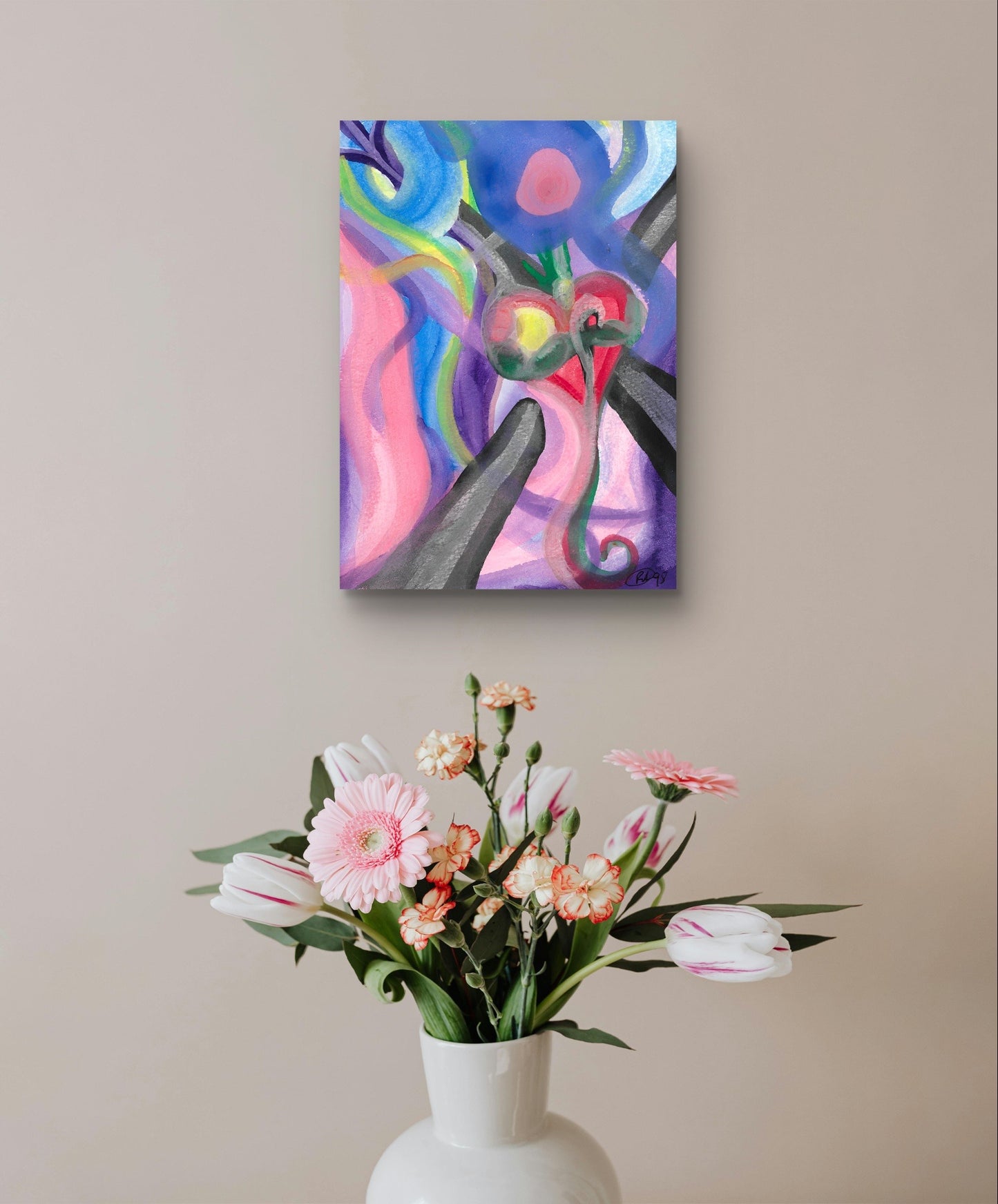 Heart painting on brown wall behind flower vase.