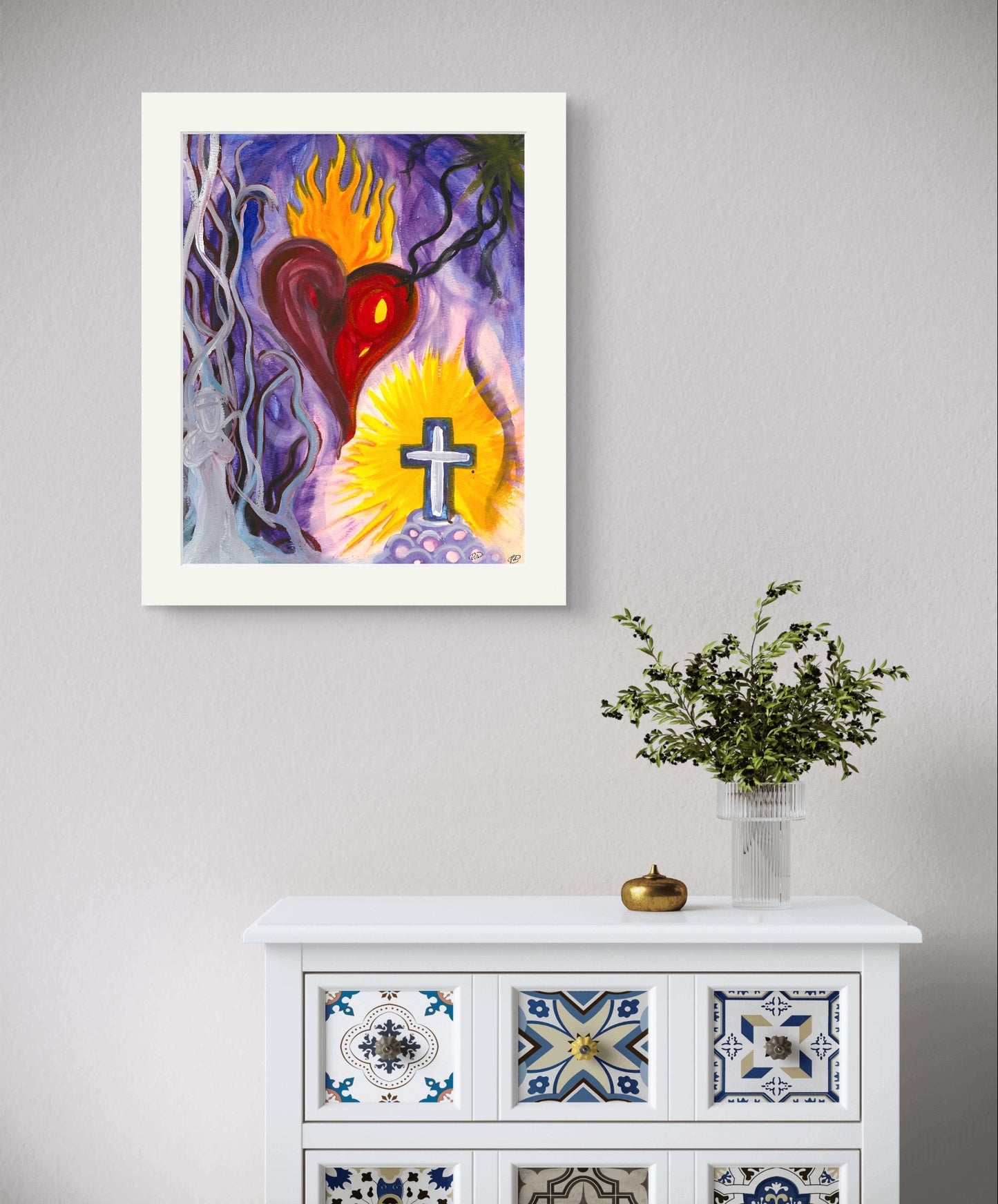 Bordered version of praying painting on white wall above dresser and plant.