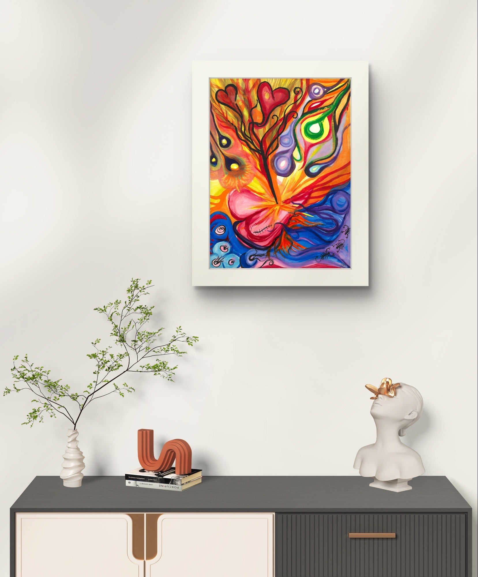 Colorful painting on white wall above black dresser behind plant.