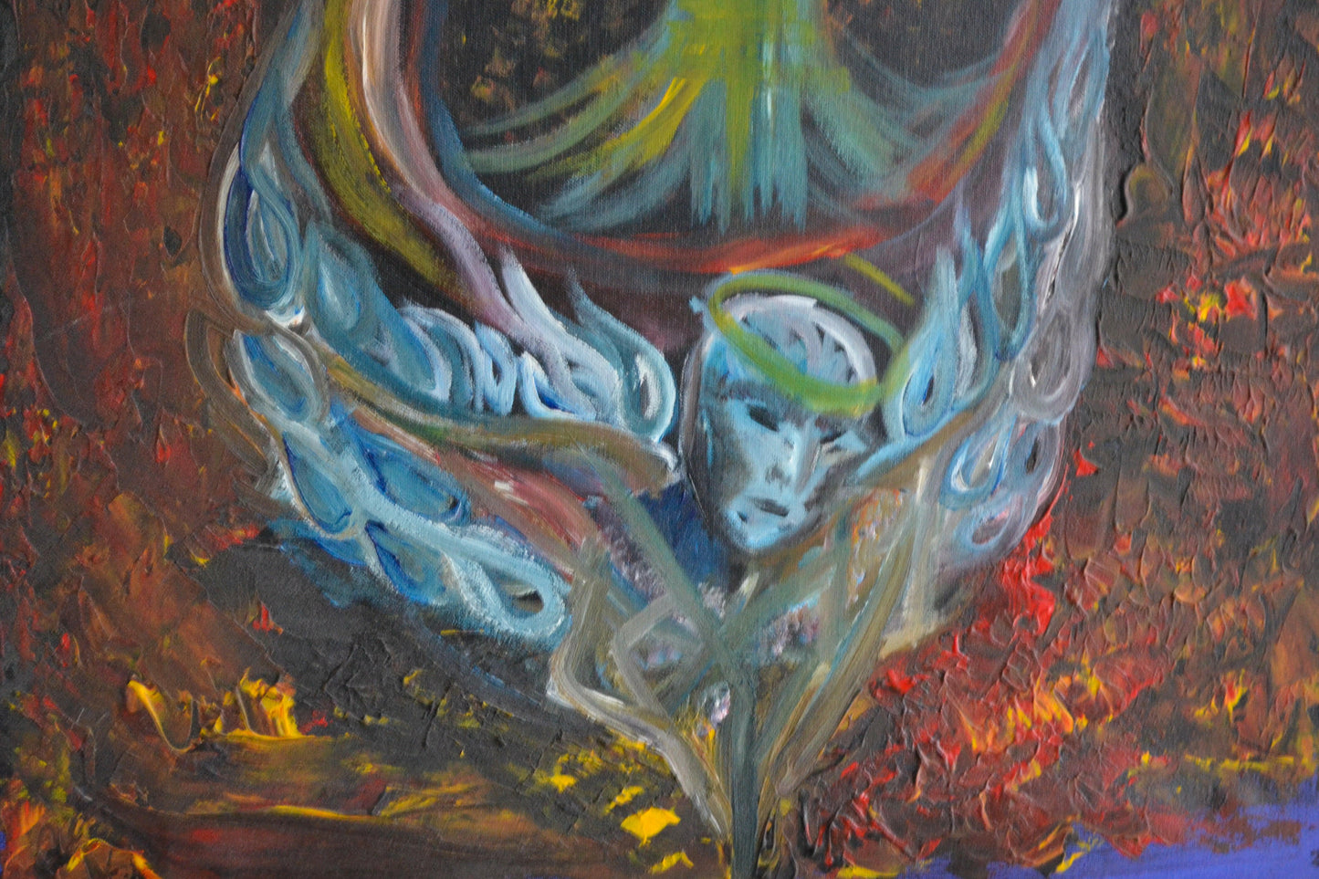 Closeup of ocean painting with angel anchor, skulls, and cross.