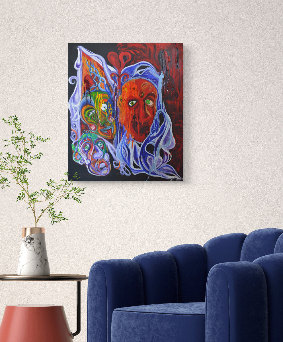 Three faced monster painting on white wall behind plant and blue chair.