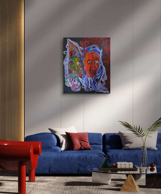 Three faced painting on white wall above blue couch and red chair.